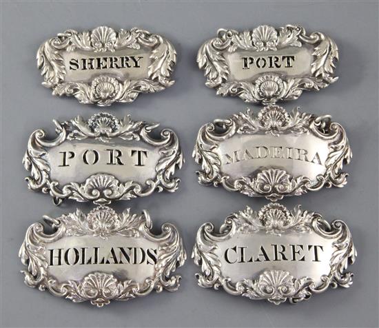 A group of George III and later silver wine labels